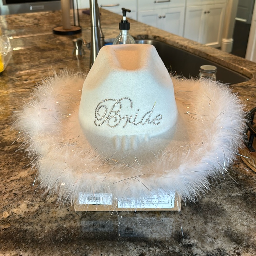 Brand new David’s Bridal Bride cowboy hat. Asking 30